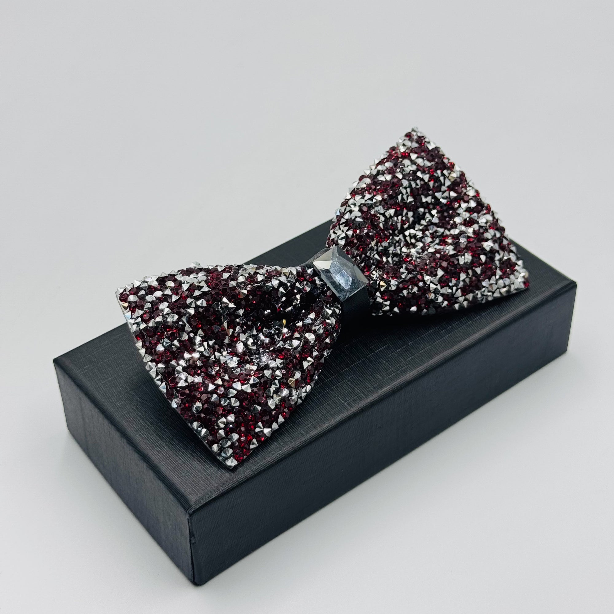 Bold & Stylish: Black, Red, and Silver Stone Bow Tie