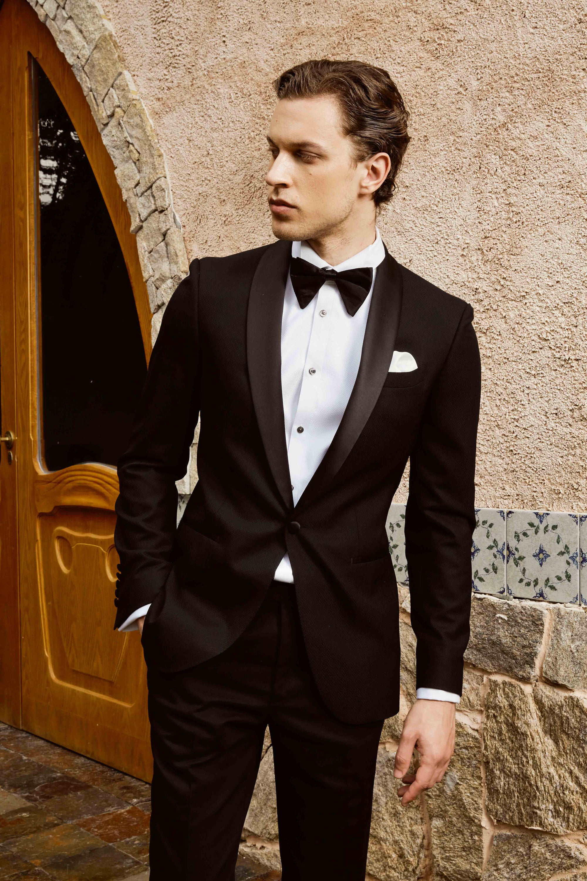 Black suit set with textured print and customized bow
