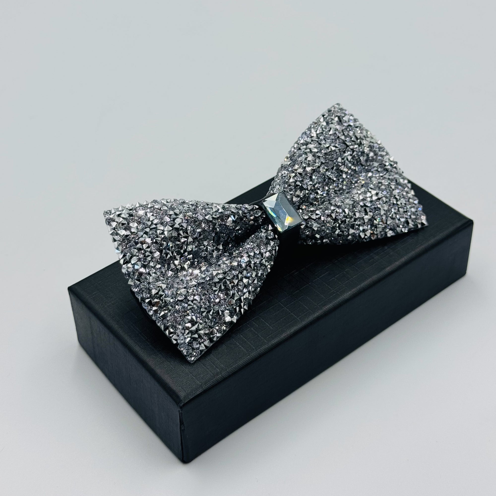 Shine Bright with Our Silver Stone Bow Tie