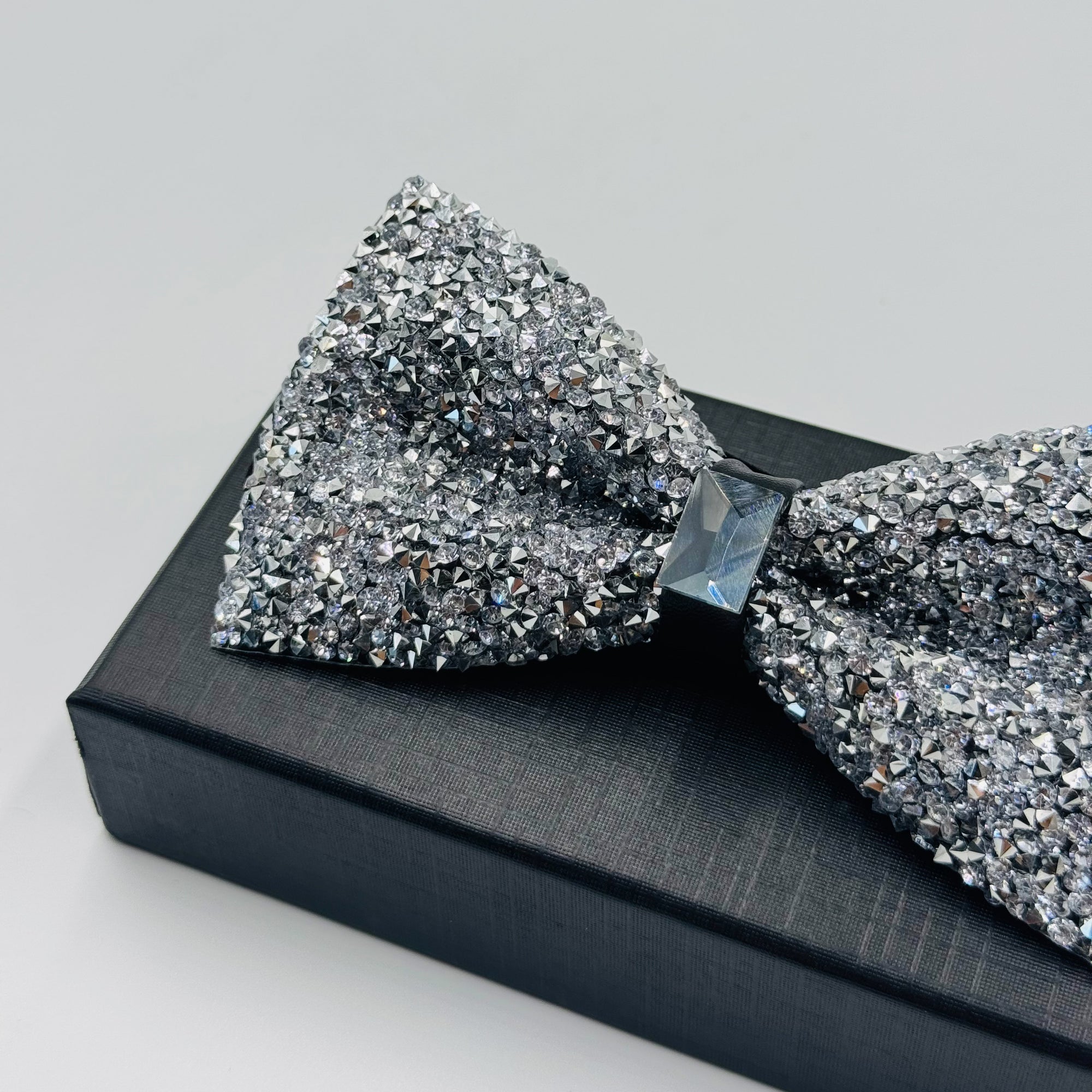 Shine Bright with Our Silver Stone Bow Tie